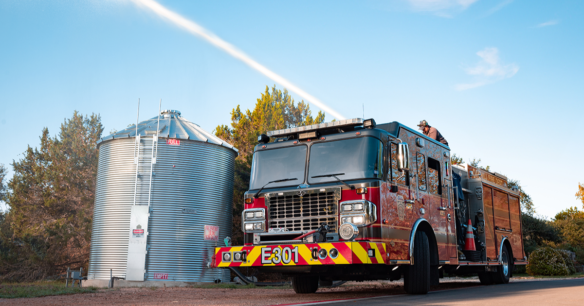 Photograph of a local fire department conducting a fire marshal inspection (field test) on an NFPA 22 equivalent CorGal® fire protection tank in Central Texas. Source: intellectual property of Water Storage Tanks, Inc.