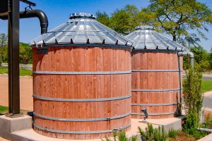 Photo of TimberTanks® collecting rainwater for a local business in Central Texas. As the intellectual property of Water Storage Tanks, Inc., this image is subject to copyright.