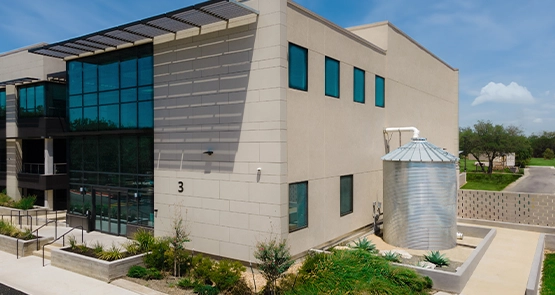 Photo of a CorGal® rainwater harvesting tank supplying water reuse for a business in Central Texas. As the intellectual property of Water Storage Tanks, Inc., this image is subject to copyright.