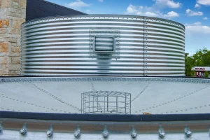 Photo of a CorGal® tank with an inverted roof for rainwater harvesting. As the intellectual property of Water Storage Tanks, Inc., this image is subject to copyright.