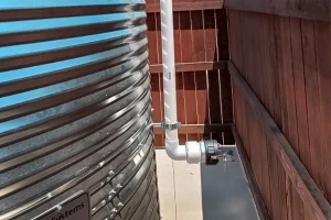 Photo of a water truck fill connection installed on a CorGal® rainwater storage tank. As the intellectual property of Water Storage Tanks, Inc., this image is subject to copyright.